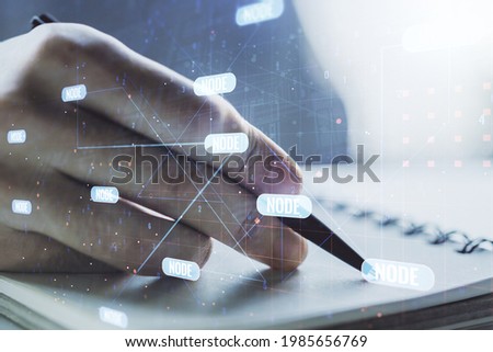 Double exposure of abstract creative programming illustration and man hand writing in notepad on background, big data and blockchain concept