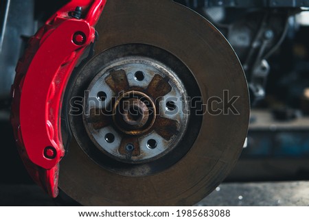 car under repair brake disc and caliper