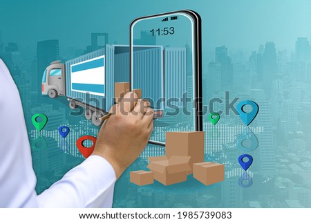 Hand touch phone screen with freight car on map, online ordering and delivery service concept
