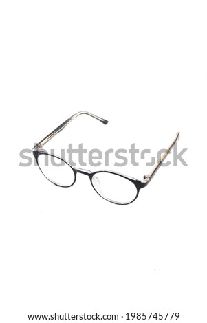 isolation glasses on white background. black round eyeglass frames in the photo from the front on a white background