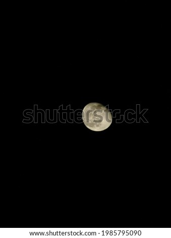 The moon is black night sky isolated