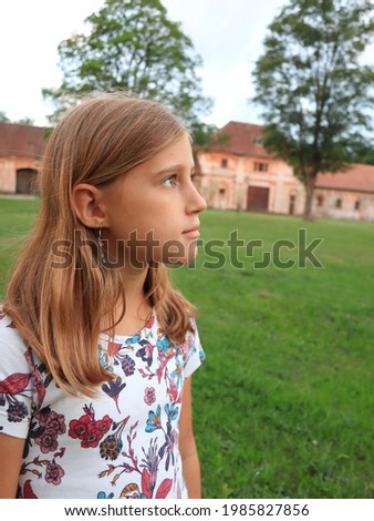 Girl posing in the space of an old building