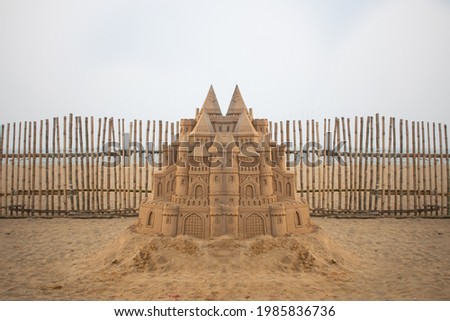 Sand castle sculpture on the beach
