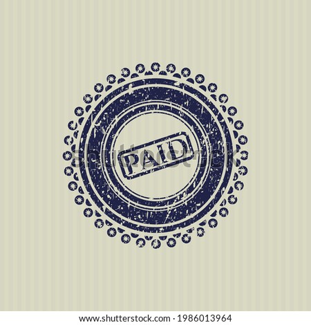 Blue paid icon inside distress rubber stamp with grunge texture. 