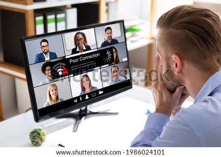 Video Conference Slow Internet Connection. Poor Signal Problem Royalty-Free Stock Photo #1986024101