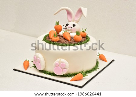 Concept of cake Structure.concept of cake structure with rabbit and carrots.