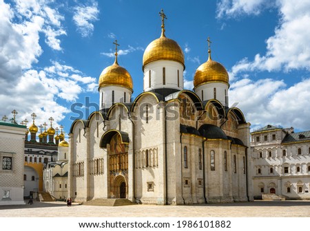 Dormition Cathedral (Assumption) inside Moscow Kremlin, Russia. It is famous landmark of Moscow. Russian Orthodox cathedral decorated with ancient frescoes. Old church in Moscow center in summer. Royalty-Free Stock Photo #1986101882