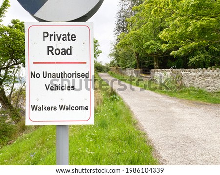 Walking route road sign in the country no vehicles