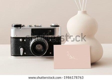 Business card with an analog camera