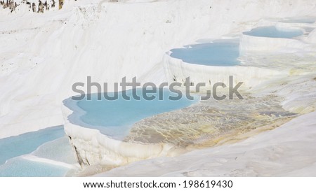Famous landmark in Turkey, Pamukkale. White calcium travertines and pools as a heritage geological landscape. Pamukkale means cotton castle.