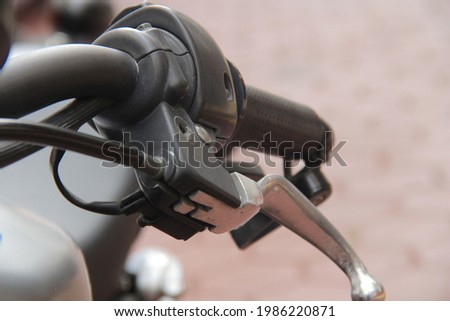 Closeup of motorcycle handlebar and brake pump motorcycle 