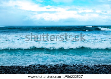 wave on rocky beach of Riviere Des Galets, in the south of the republic of Mauritius.