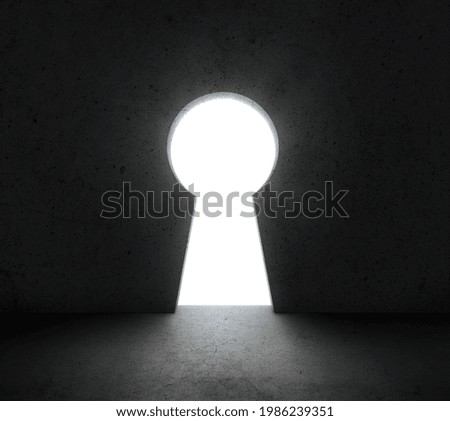 Wall with key hole light shines from. Dream, success, opportunity. concept business Royalty-Free Stock Photo #1986239351