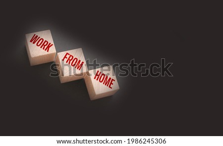 Work from home, words on wooden cubes. Distant job freeance business concept.