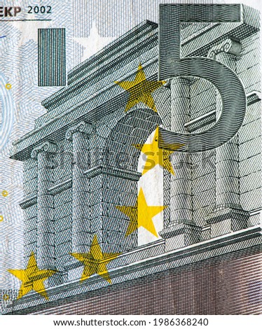 Classical architecture Arch on obverse five euro banknote, 5 euro banknote has a grey color scheme. The five euro banknotes depict arches and doorways in Classical architecture.