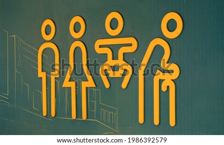 All Gender restroom sign outside a public bathroom
