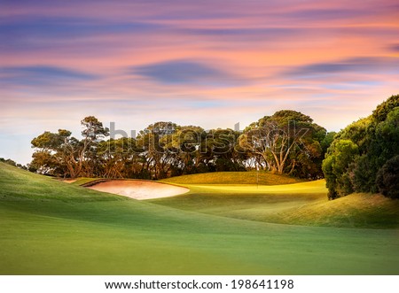 Golf Course at Sunset Royalty-Free Stock Photo #198641198