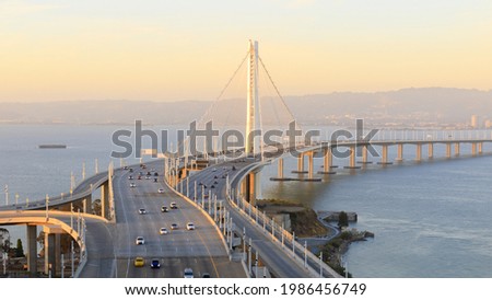 Sunset over the San Francisco-Oakland Bay Bridge Eastern Span. Treasure Island, San Francisco, California, USA.
