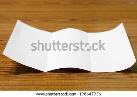 paper on wood background