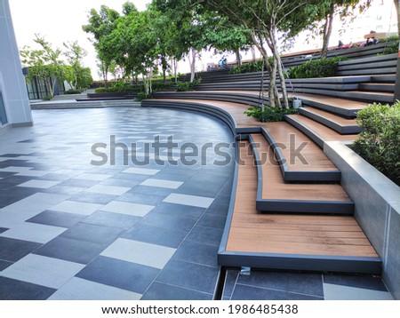 Outdoor Amphitheatre with tree garden Royalty-Free Stock Photo #1986485438