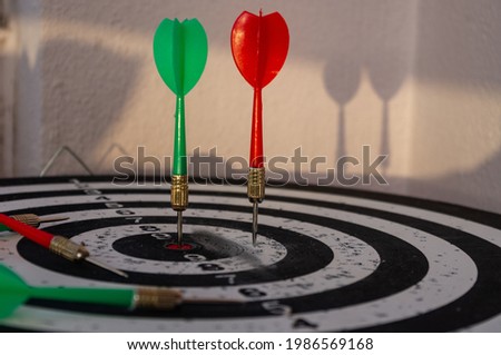 closeup view of darts arrows on the table