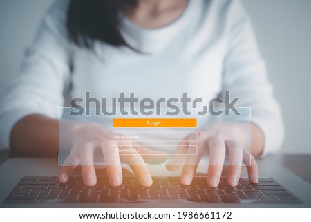 Woman using access window to log in entering password on laptop, Sign up username password Enter log in, Cyber protection, Information privacy. Protection Internet and technology Concept. Royalty-Free Stock Photo #1986661172
