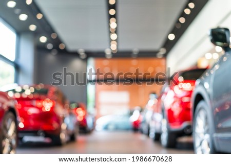 blur view of row new modern car in showroom