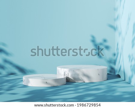 Blue background with white marble podium, 3d render. Royalty-Free Stock Photo #1986729854