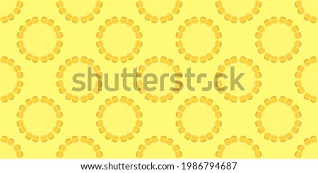 yellow candies are laid out in circles on a seamless banner. Picture for wrapping paper or ceramic tiles