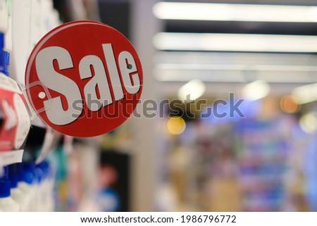 Discount sign in supermarket .shopping concept