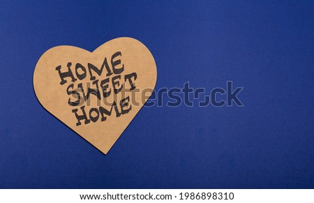 Home Sweet Home - buy your dream home concept on blue background banner.