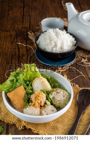 Yong tau foo , yong tau fu or Liong Tahu (In Indonesia). is a Hakka Chinese cuisine consisting primarily of tofu filled with ground meat mixture or fish paste. Royalty-Free Stock Photo #1986912071