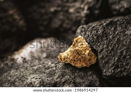 bauxite, is a natural mixture of aluminum oxides, abundant sedimentary mineral used in industry, mineral extraction Royalty-Free Stock Photo #1986914297