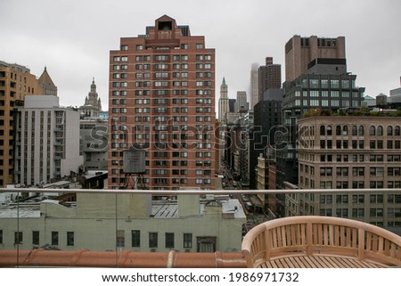 These are photos of a rooftop in New York City.  Royalty-Free Stock Photo #1986971732