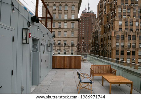 These are photos of a rooftop in New York City.  Royalty-Free Stock Photo #1986971744