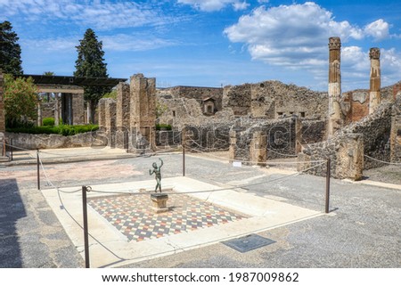 Archaeological Park of Pompeii. House of the Faun. The famous statue of the dancing satyr or Faun. Campania, Italy