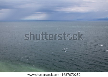 Sea and waves at changing weather near the coastline of Strunjan, Piran, gulf of Triest, Adriatic Sea