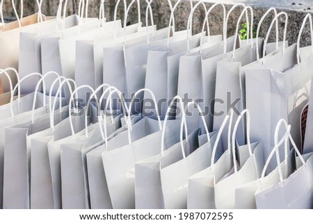 Stockholm, Sweden Rows of goodie bags at a press event. Royalty-Free Stock Photo #1987072595