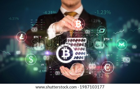 Businessman holding currency symbols concept