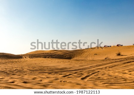 Desert safari and sand dunes bashing in public vehicles in Dubai, United Arab Emirates. Dubai is famous for Sand dunes bashing, Desert safari in the all of United Arab Emirates. Dubai Tourism. Travel.