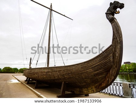 Salakkalahti Bay Embankment. Replica of ancient Viking sailing ships drakkar. VIBORG, RUSSIA Royalty-Free Stock Photo #1987133906
