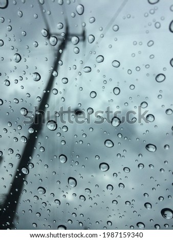 Rainyday in cloudy sky droped at glasses