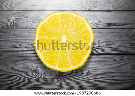 Juicy yellow lemon slice on a background