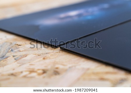 Detail of the thickness of a printed photograph. Image printing with 3mm thick aluminum or pvc surface. Print decoration photographs. Prints, Fine Art.