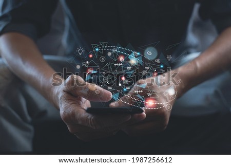 IoT, Internet of Things, online shopping, digital marketing, E-commerce, metaverse, social network connection concept. Man using mobile phone with technology icons, internet searching via mobile app