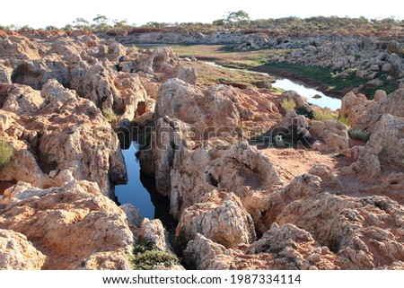 Rocky sandstone water catchment area in outback Australia.