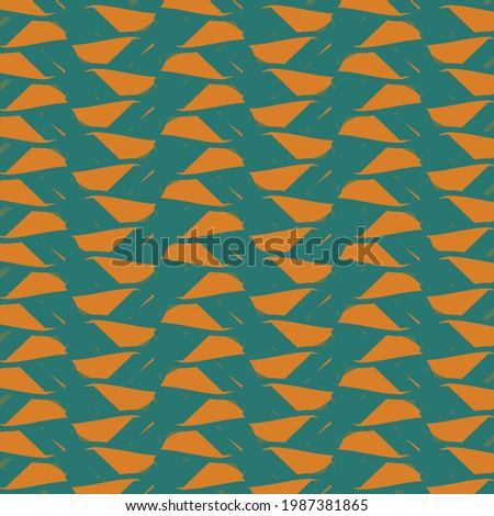 Mosaic with orange pieces arranged in a zigzag pattern on a blue background. Geometric ethnic motif.