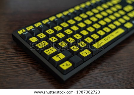 Close-up of a keyboard with the Russian alphabet for the blind. Braille