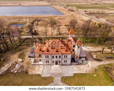 Scenic aerial view on old palace in Pidhirtsi, near Stryi, Lviv Region, Ukraine. Beautiful view from flying drone.