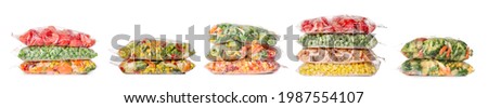 Collage of different frozen vegetables on white background Royalty-Free Stock Photo #1987554107